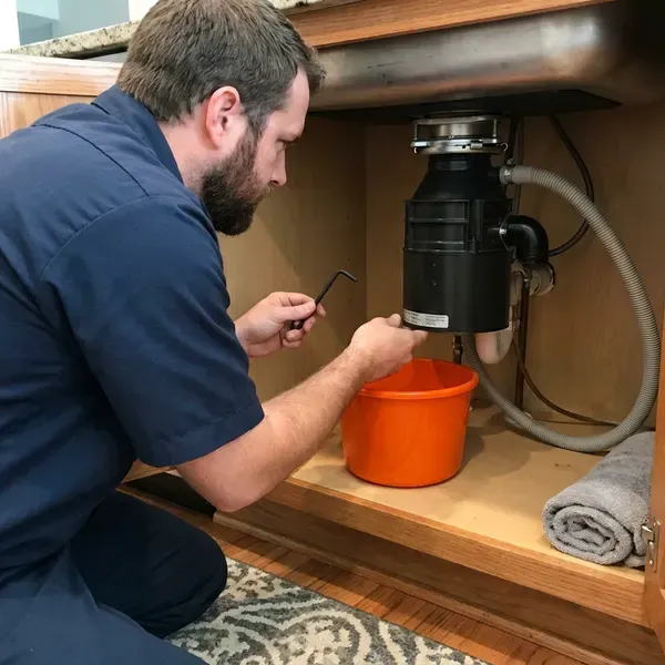 CVR Plumbing technician providing garbage disposal repair in Phoenix, AZ